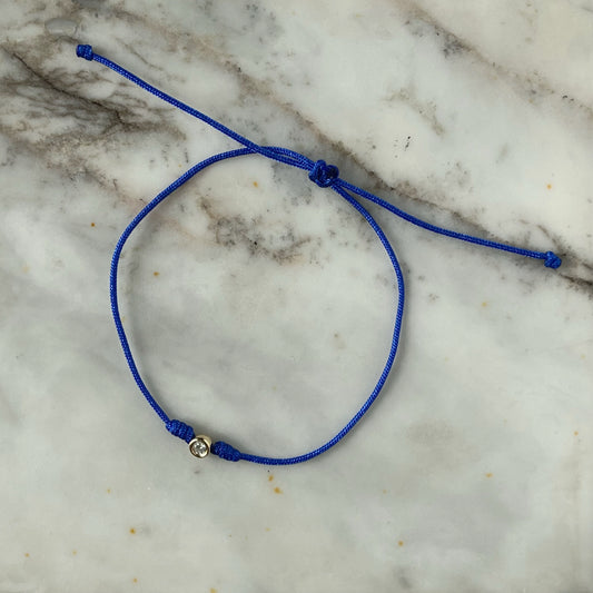 Pulsera con diamante biselado 0.05ct y oro de 14k con cordón