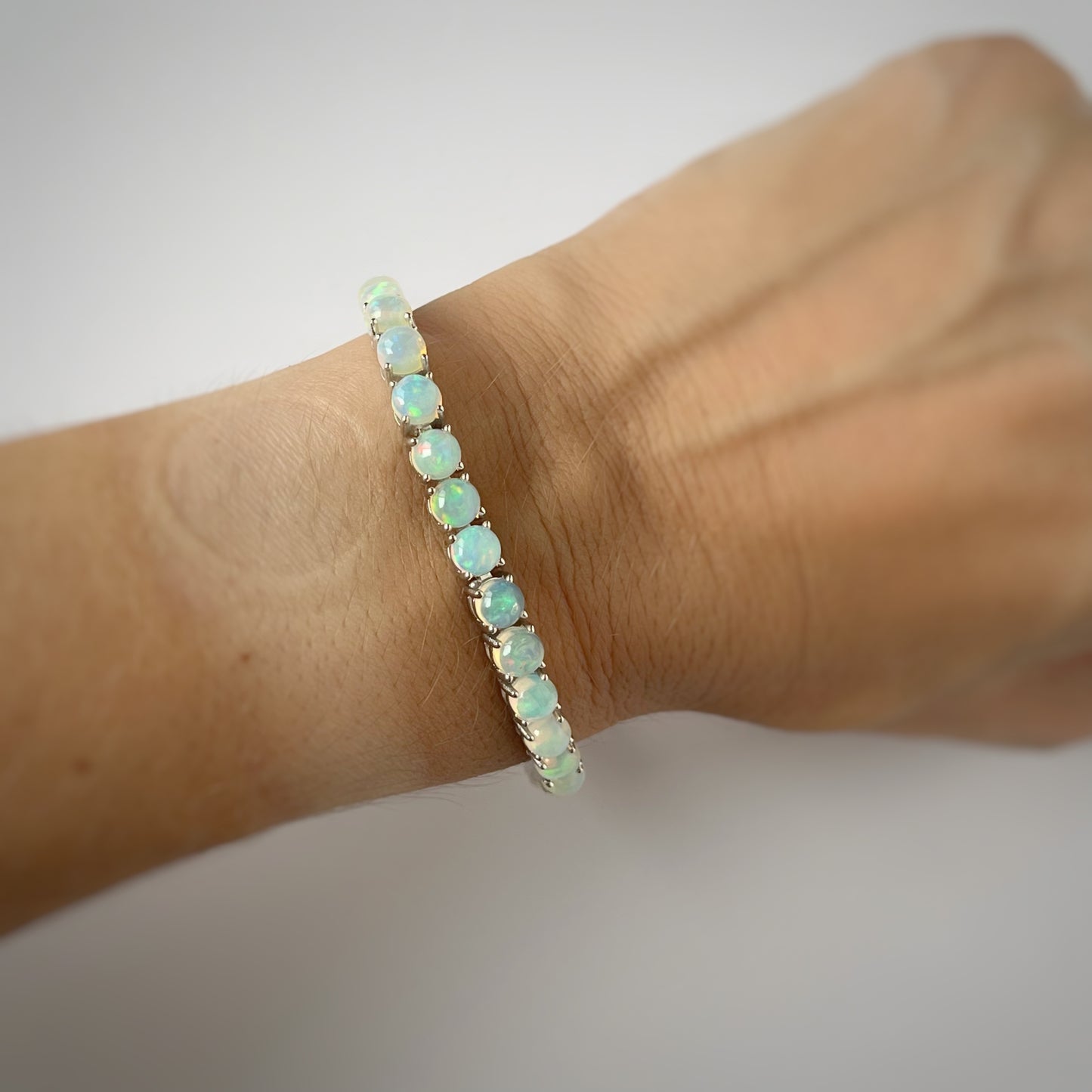 Pulsera tenis de plata y ópalo 12ctw