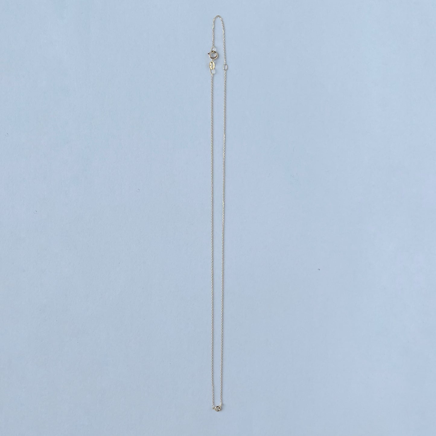 Collar en oro amarillo 14k con diamante biselado 0.02ct