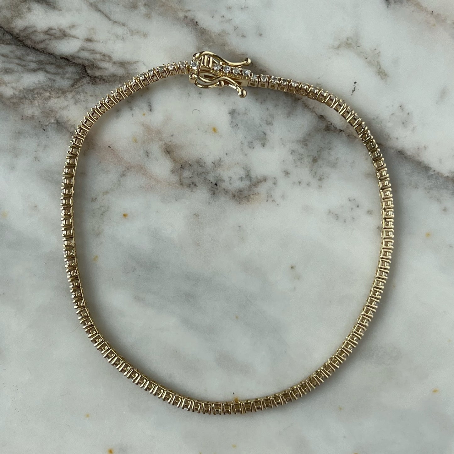 Pulsera tenis en oro amarillo 14k con 1ctw de diamantes