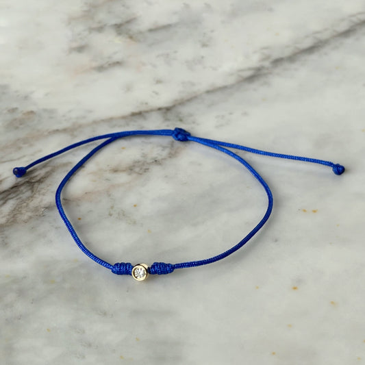 Pulsera con diamante biselado 0.05ct y oro de 14k con cordón
