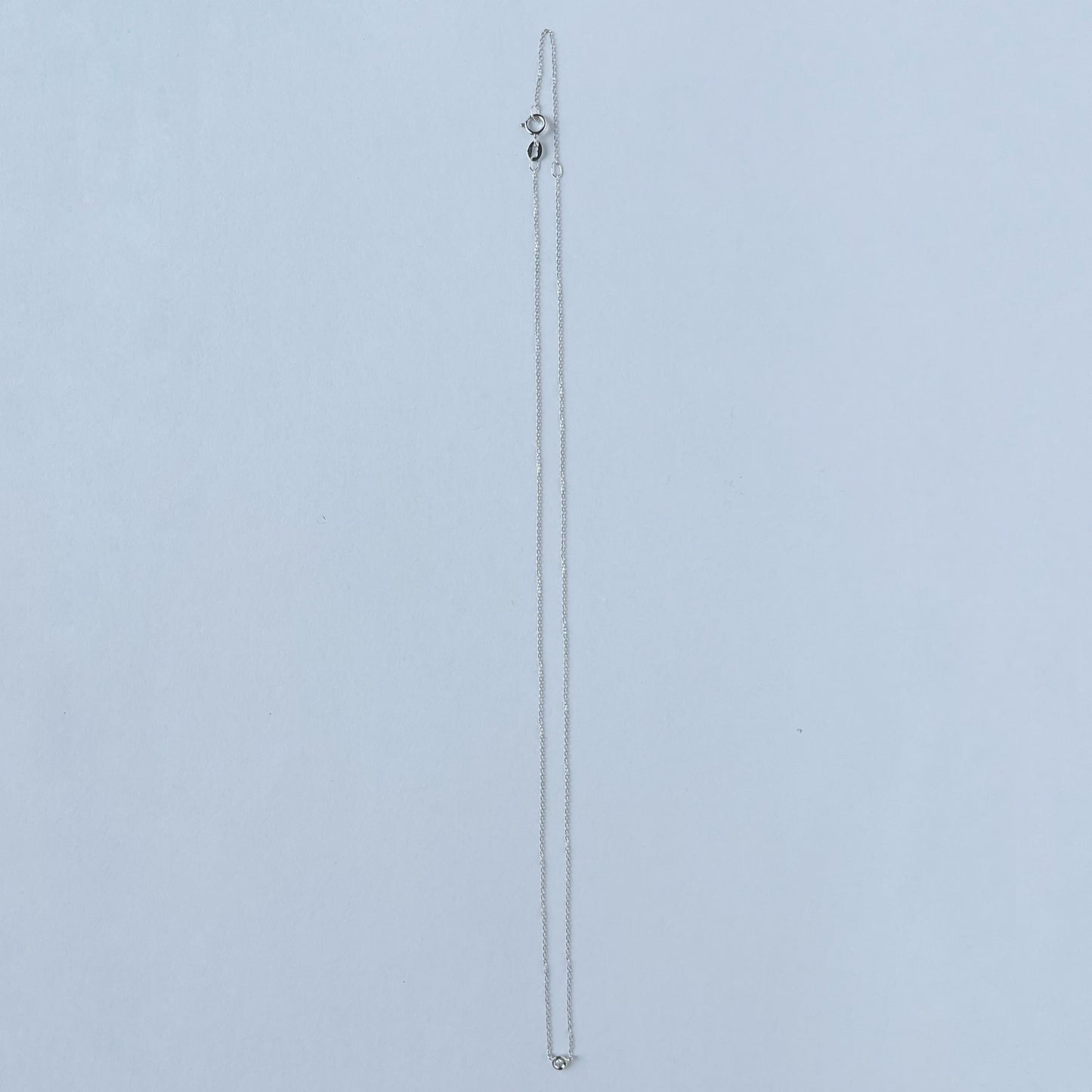 Collar en oro blanco 14k con diamante biselado 0.02ct