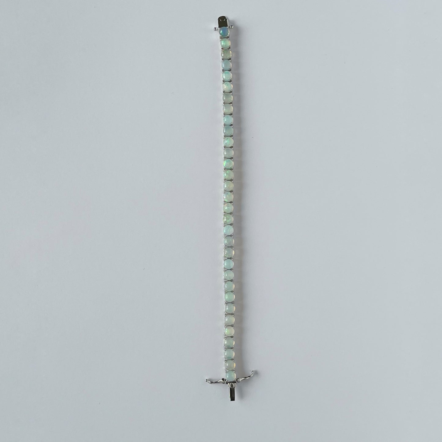 Pulsera tenis de plata y ópalo 12ctw