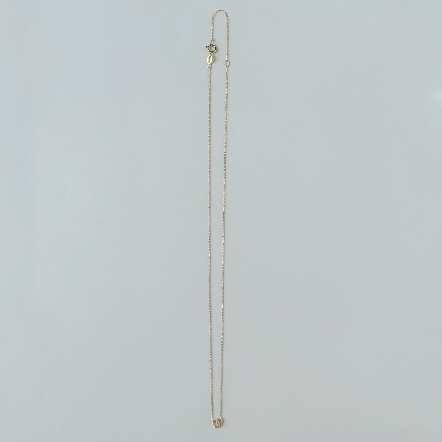 Collar en amarillo 14k y estrella mini de diamantes 0.05ctw