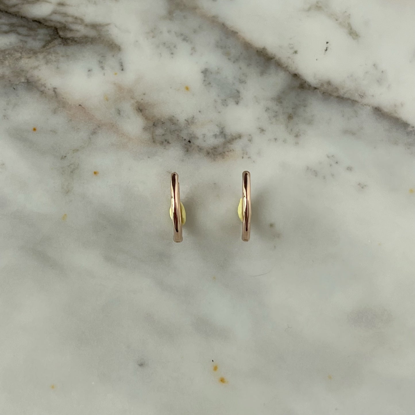 Argollas mini de oro rosa 14k