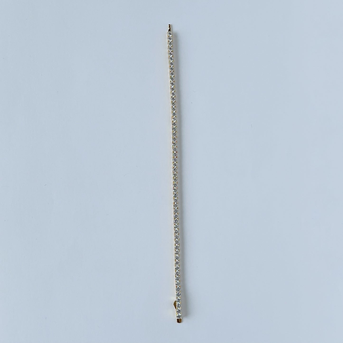 Pulsera tipo tenis en plata con baño de oro de circonitas 3ctw