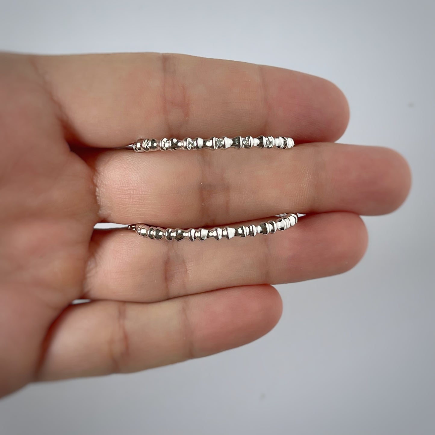 Argollas de plata de bolitas con diamantes 0.12ctw