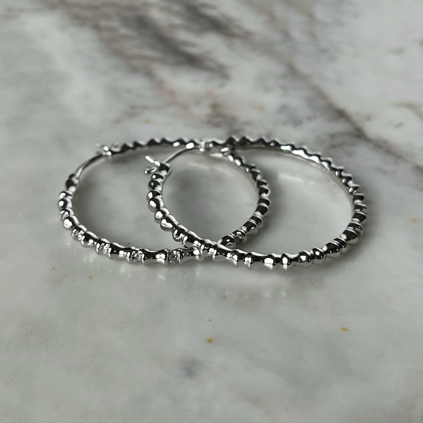 Argollas de plata de bolitas con diamantes 0.12ctw