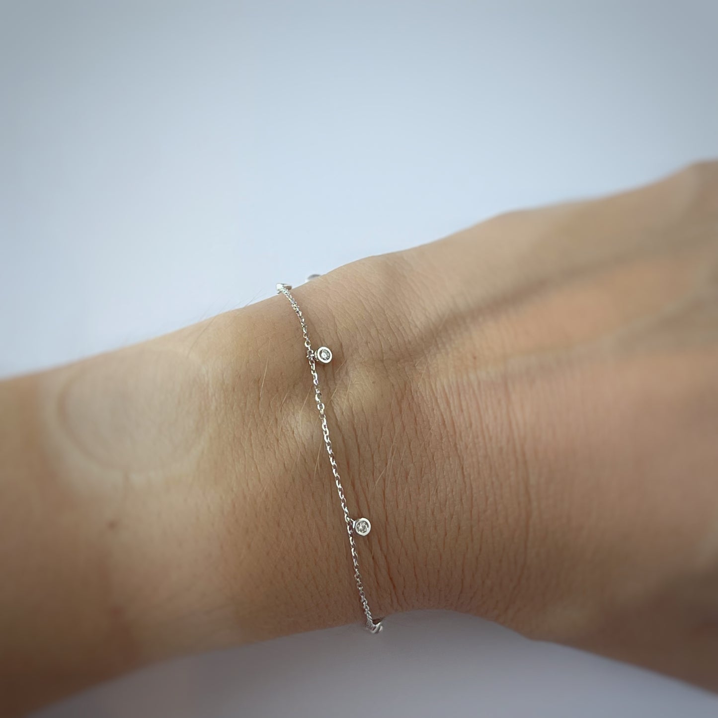 Pulsera en oro blanco de 14k con diamantes colgantes ctw