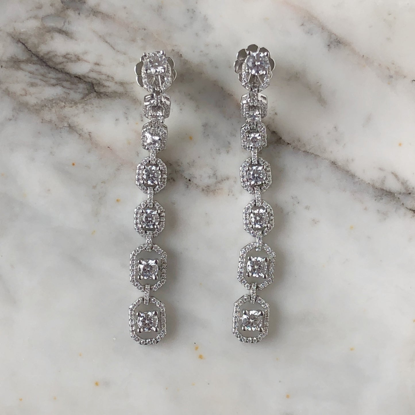 Aretes extra largos plata con baño de platino