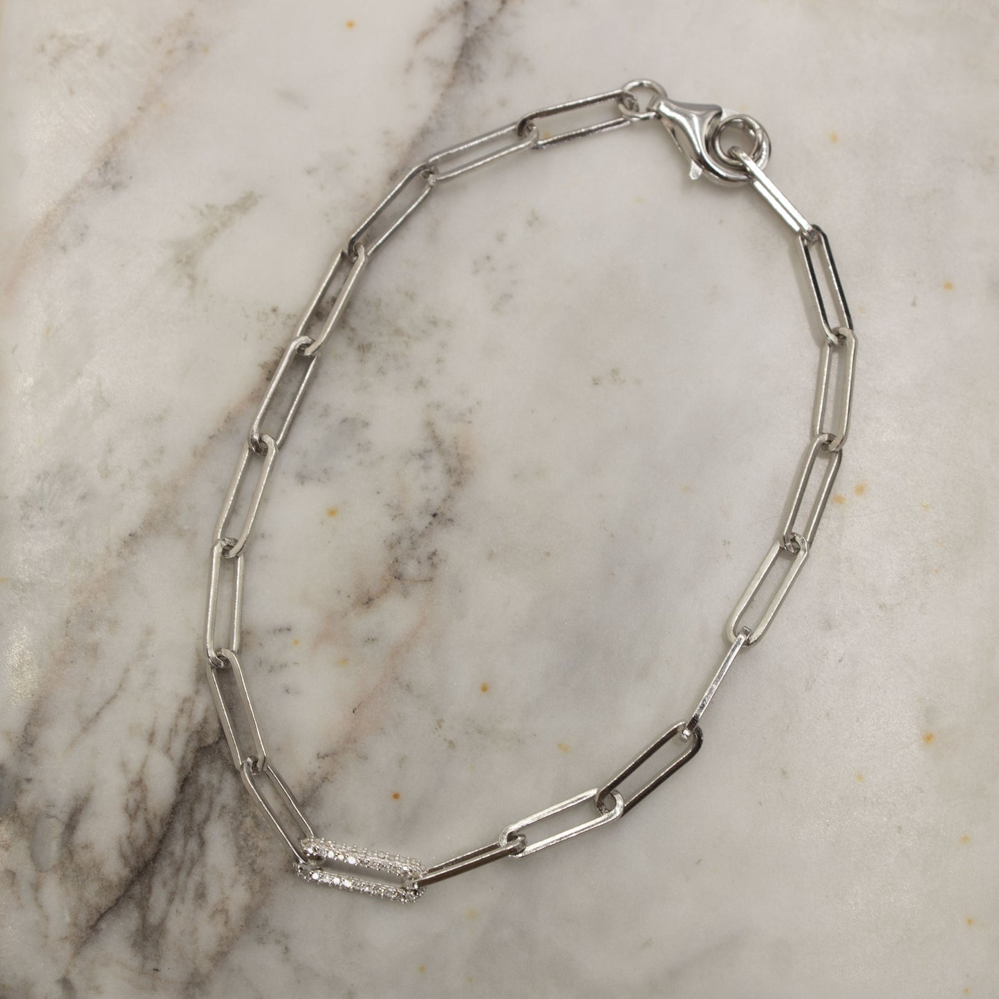 Pulsera de plata paper clip con diamantes 0.15ctw