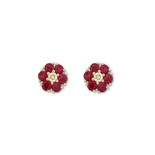 Aretes en oro amarillo 10K en forma de flor con rubíes redondos y diamantes central 0.10ctw