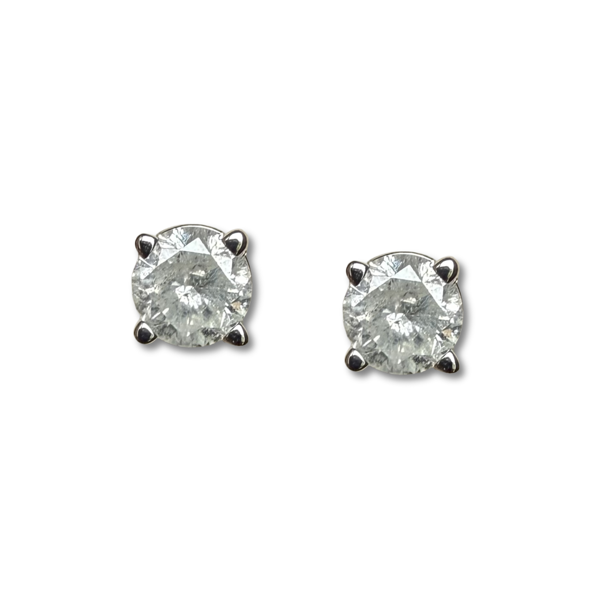 Aretes stud en oro blanco 10k con diamantes 0.20ctw