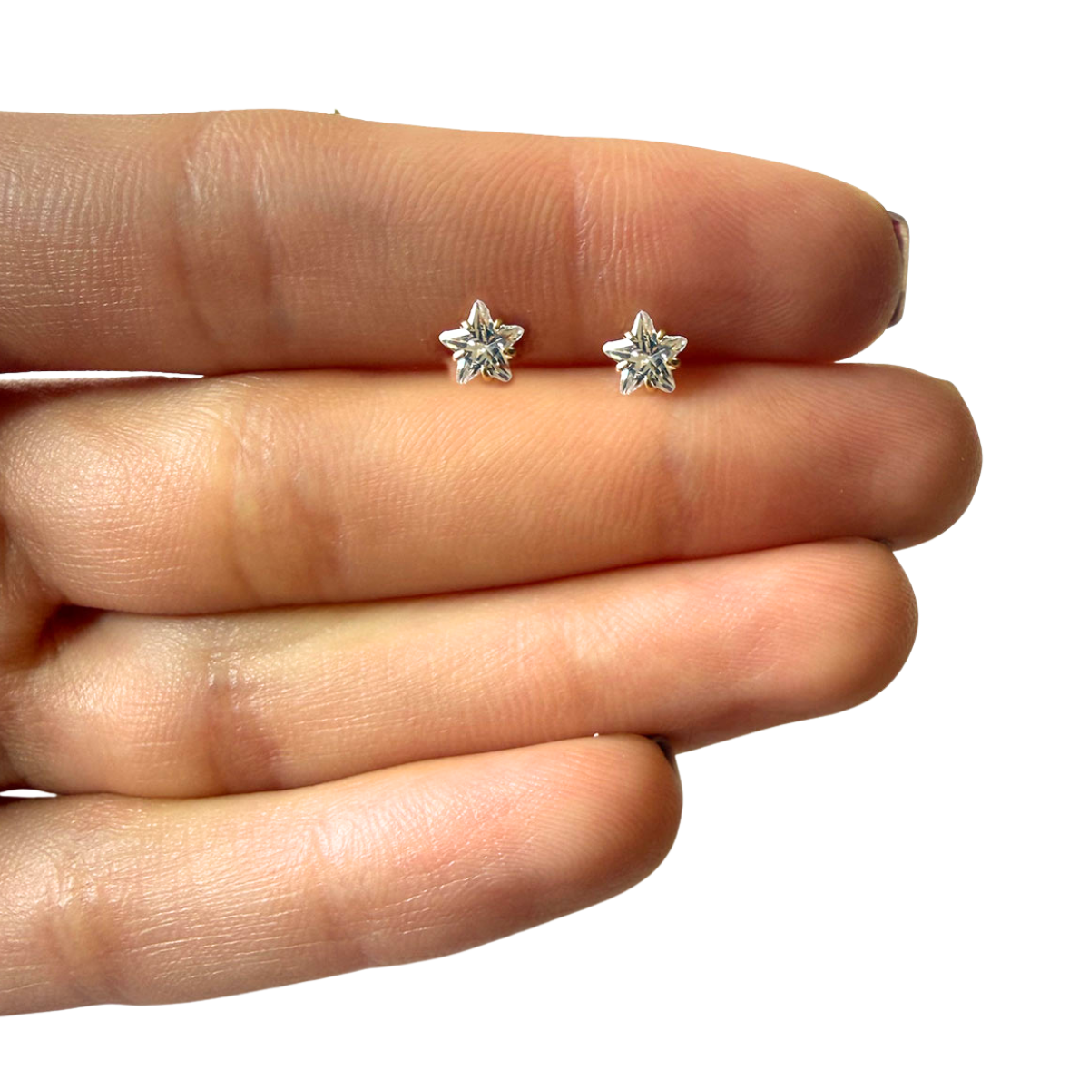 Aretes mini estrella con circón blanco en oro amarillo 14K con tope rosca