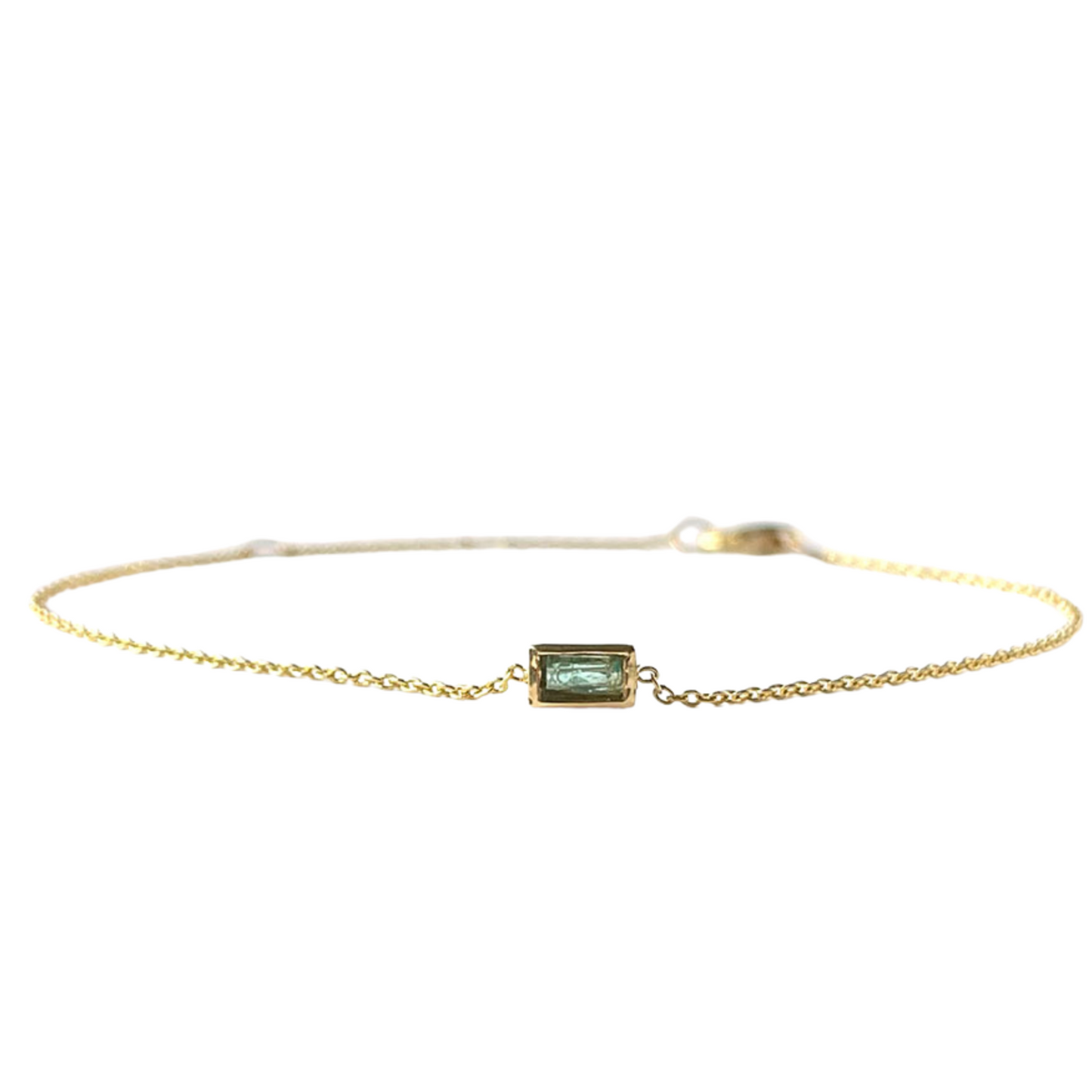 Pulsera con esmeralda corte esmeralda verde agua 0.15ct biselada con cadena en oro amarillo 14k