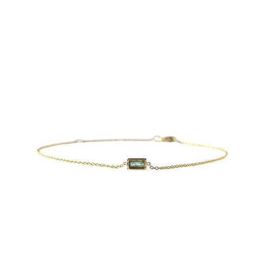 Pulsera con esmeralda corte esmeralda verde agua 0.15ct biselada con cadena en oro amarillo 14k