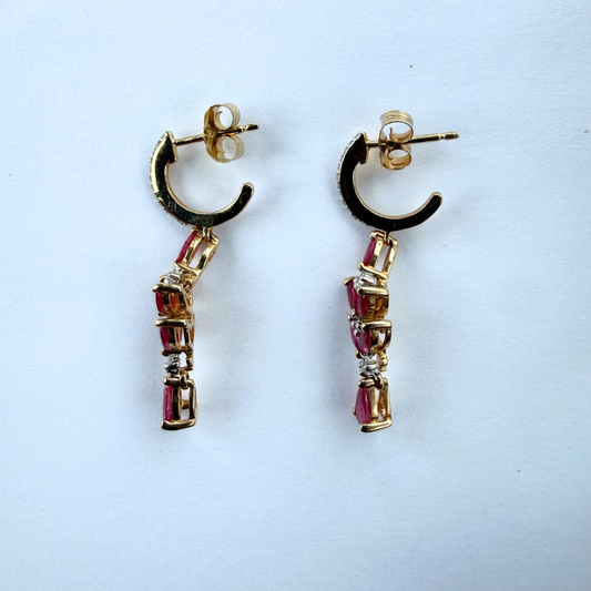 Argollas en oro amarillo 14K con rubíes y diamantes