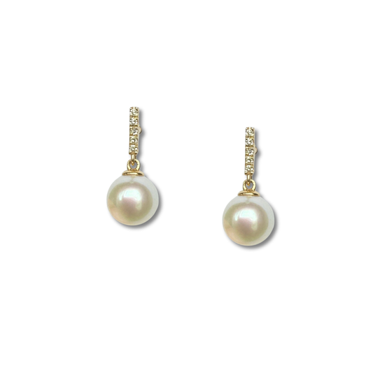 Aretes en oro amarillo 10k con barrita de diamantes 0.06ctw y perla colgante con broche a rosca