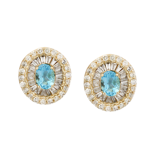 Aretes en oro amarillo 10K con topacio ovalado y halo de diamantes redondos y baguettes 0.40ctw