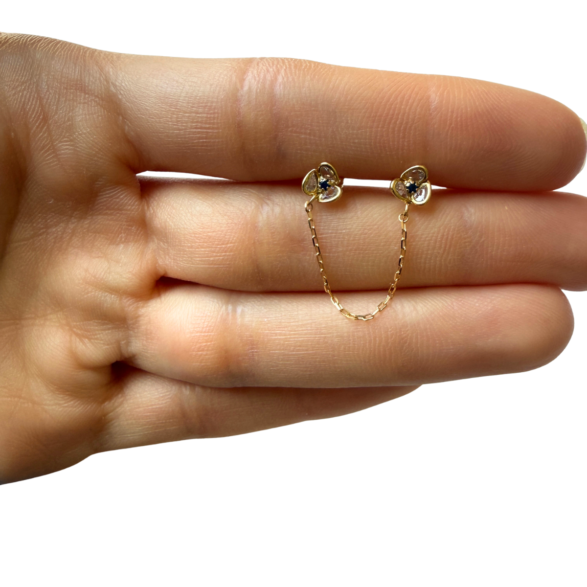 Arete doble flor de circonitas con cadena en oro amarillo 18k