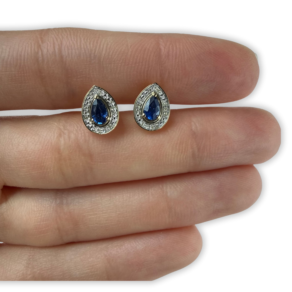 Aretes en oro amarillo 10K con gota de zafiro y halo de diamantes 0.07ctw