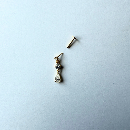 Arete piercing gota y círculos colgantes de circonitas en oro amarillo 14k