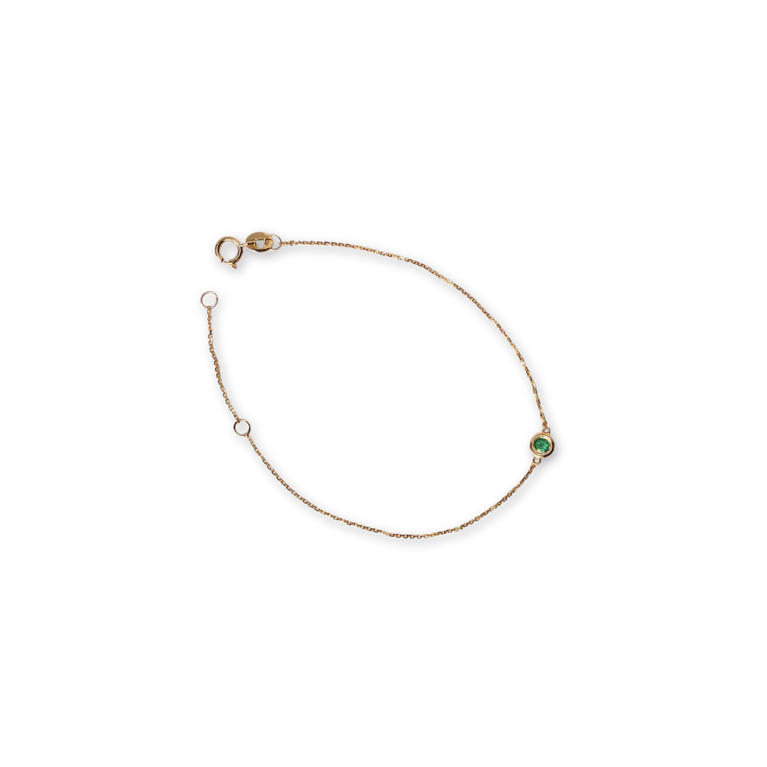 Pulsera en oro amarillo 14k con esmeralda biselada 0.11 ct