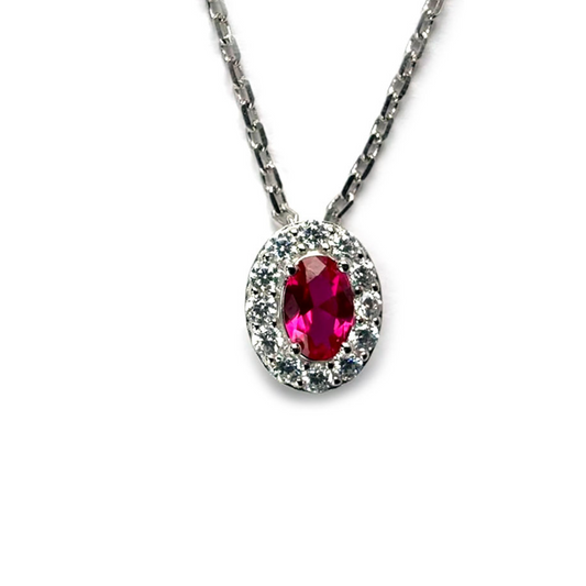 Collar de plata con baño platino y circonita ovalada roja con halo de circonitas blancas