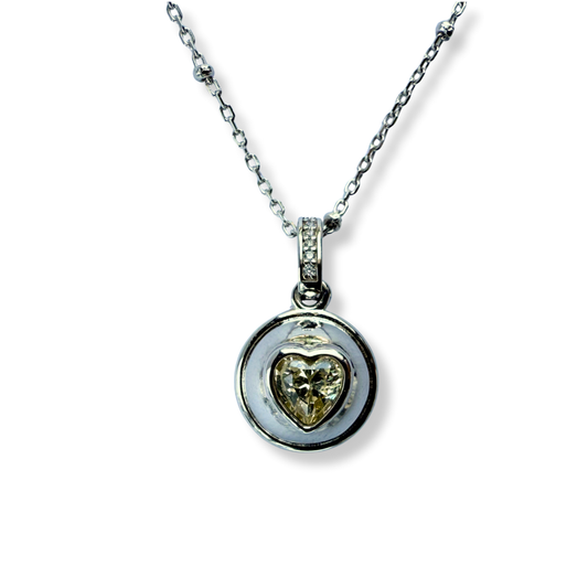 Collar de plata con baño de platino y dije bolita con corazón de circonita amarilla