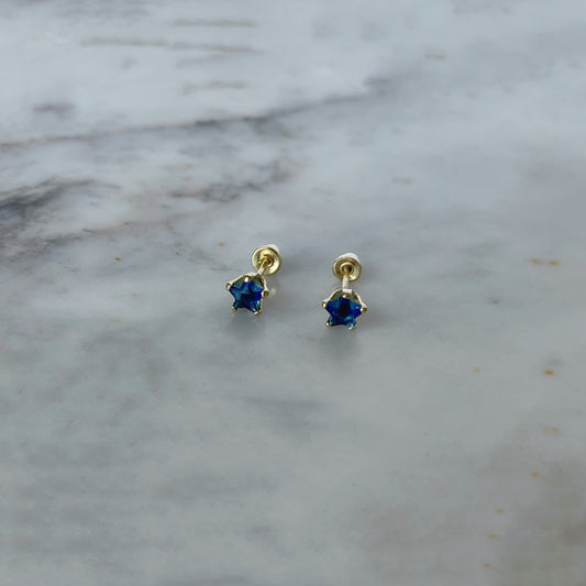 Aretes en oro amarillo 14K con estrella de circonita azul con tope rosca