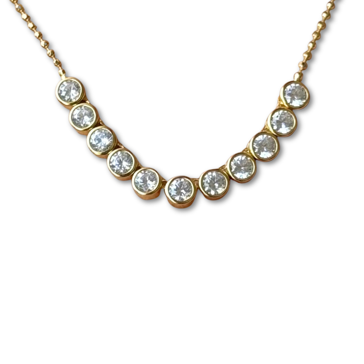 Collar de plata con baño de oro amarillo y circones redondos biselados