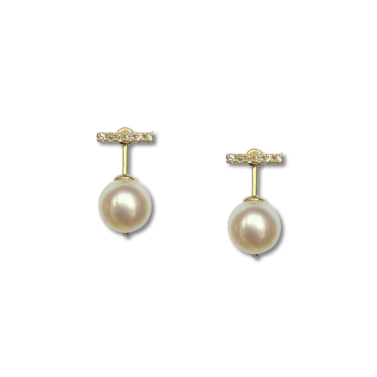 Aretes en oro amarillo 10k con barrita de diamantes 0.10ctw y perla colgante removible con broche a rosca