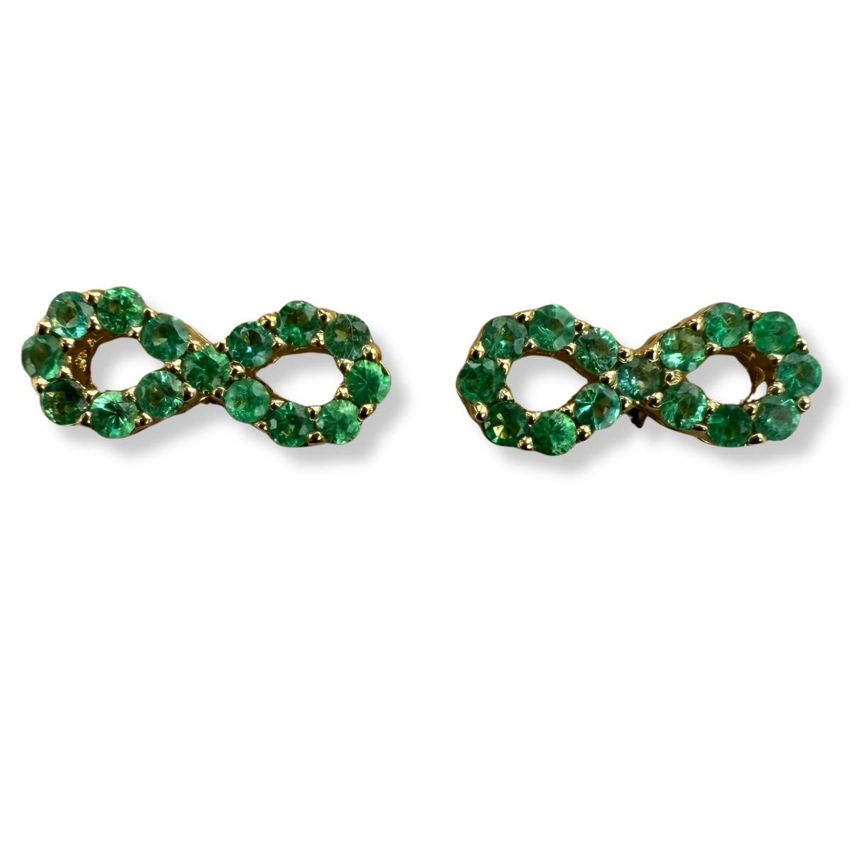 Aretes de infinito de esmeraldas en oro amarillo 10k con broche a rosca