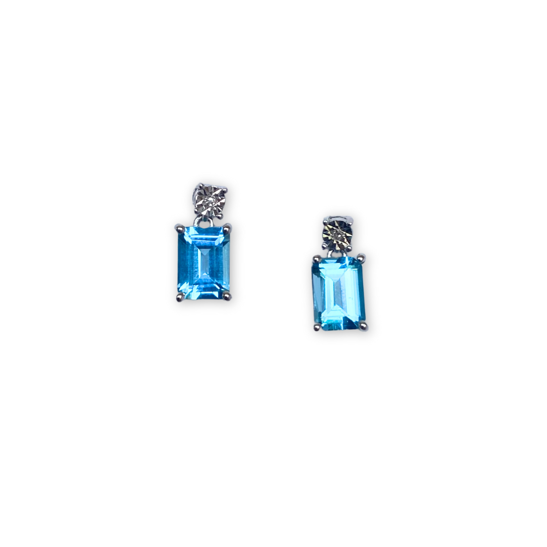 Aretes en oro blanco 10k con topacio azul y diamantes 0.01ctw