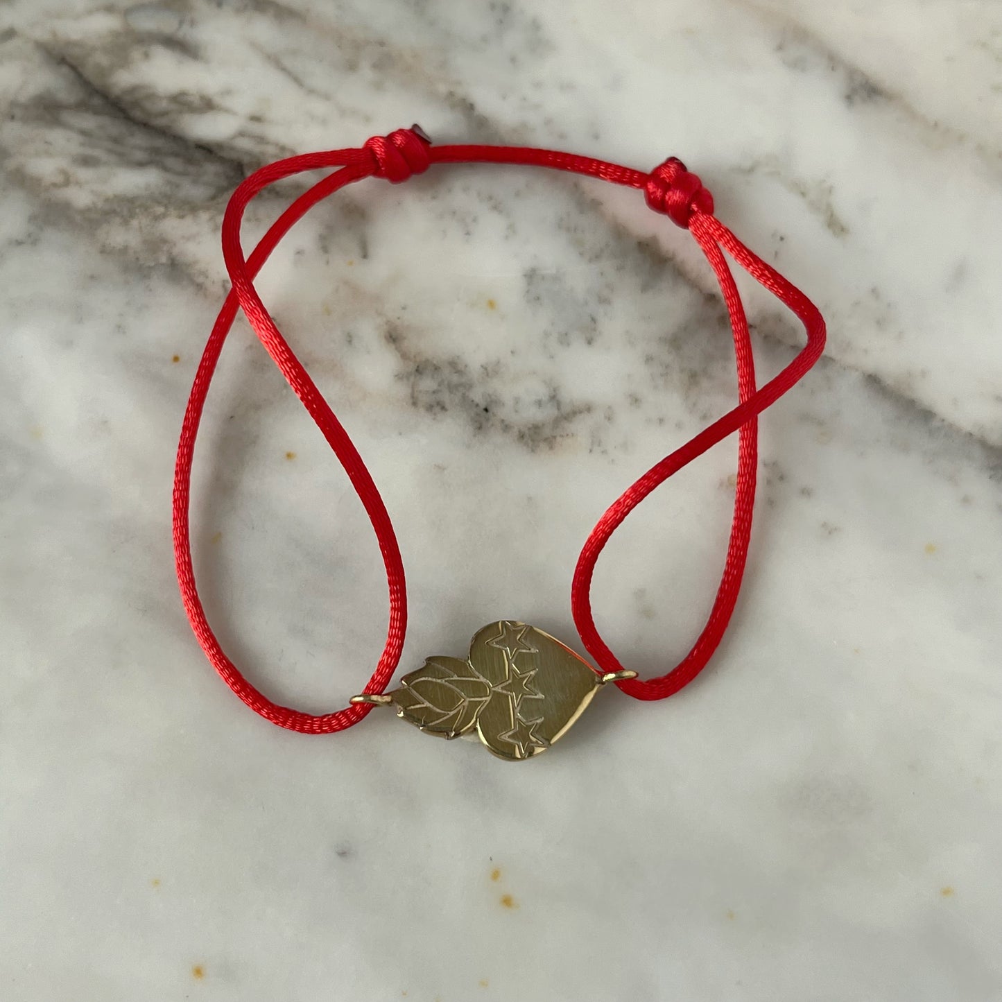 Pulsera Detente dije de Sagrado Corazón de Jesús en plata con baño de oro