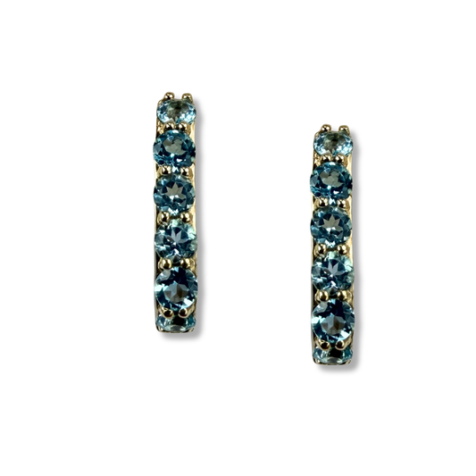 Argollas rectangulares en oro amarillo 10K con topacio azules