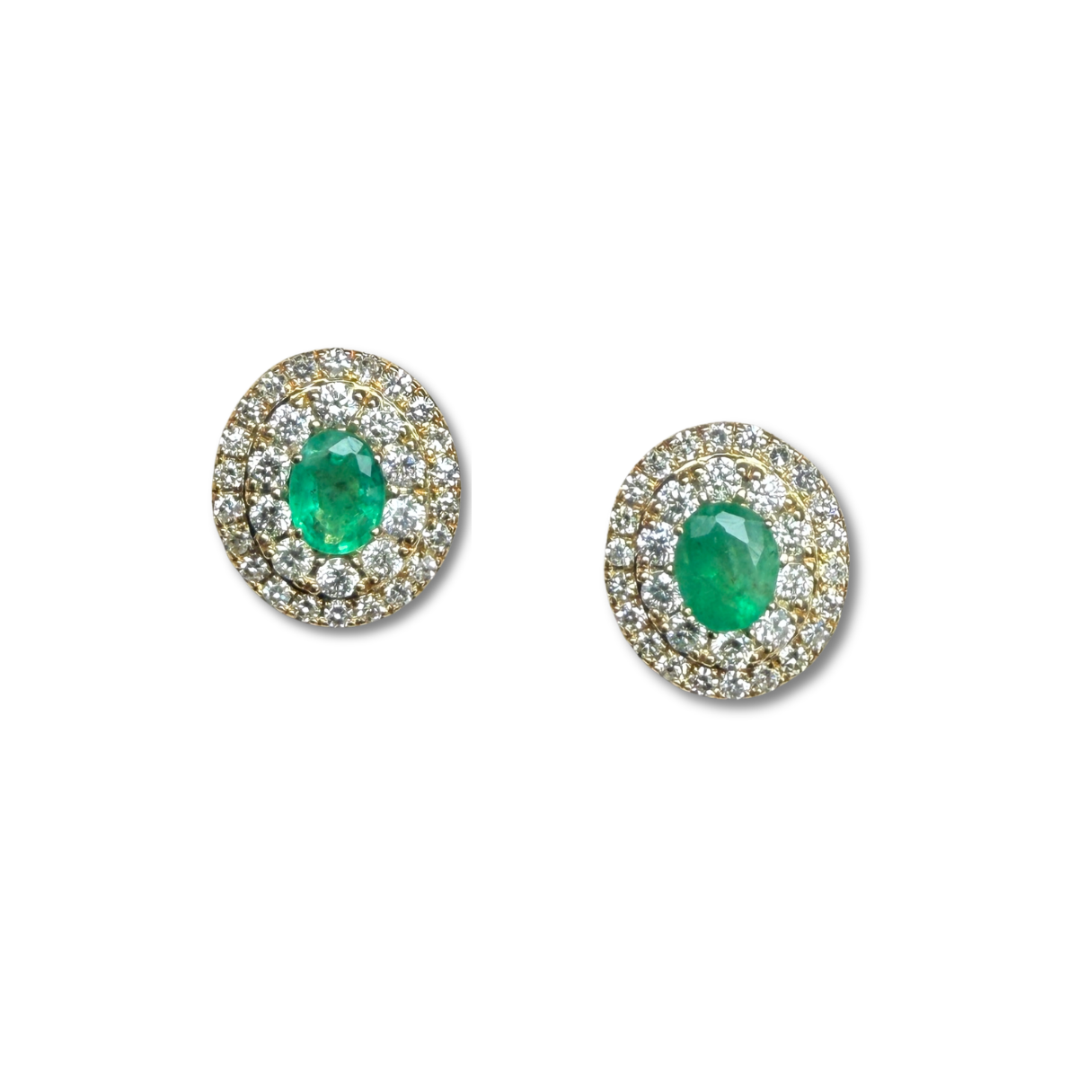 Aretes en oro amarillo 10k con esmeralda ovalada y doble halo de diamantes 0.40ctw