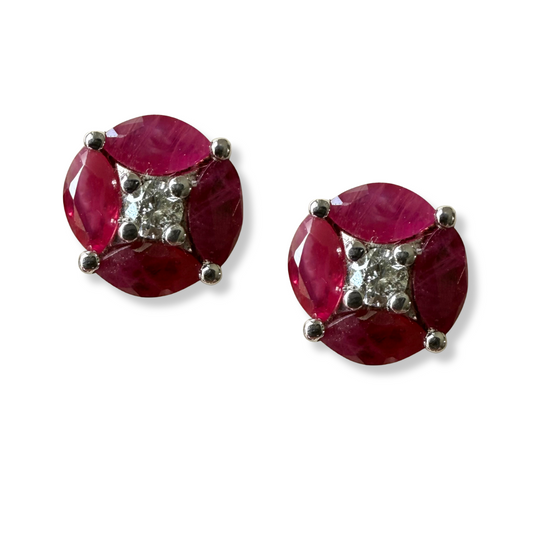 Aretes de plata redondos con marquesas de rubÍes y diamante central 0.10ctw..