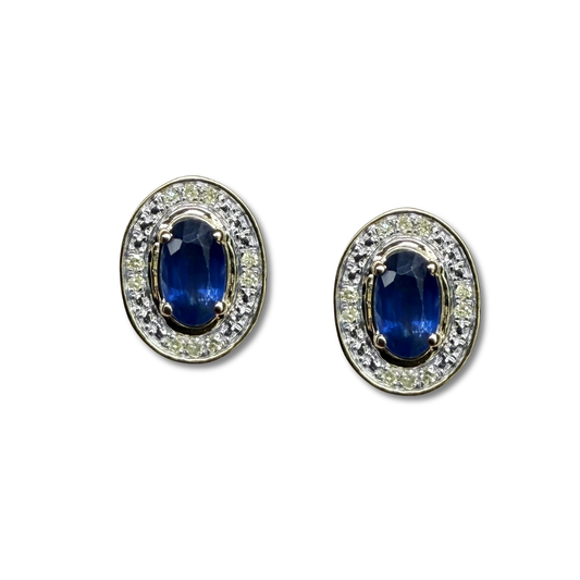 Aretes en oro amarillo 10K con zafiro ovalado y halo de diamantes 0.05ctw