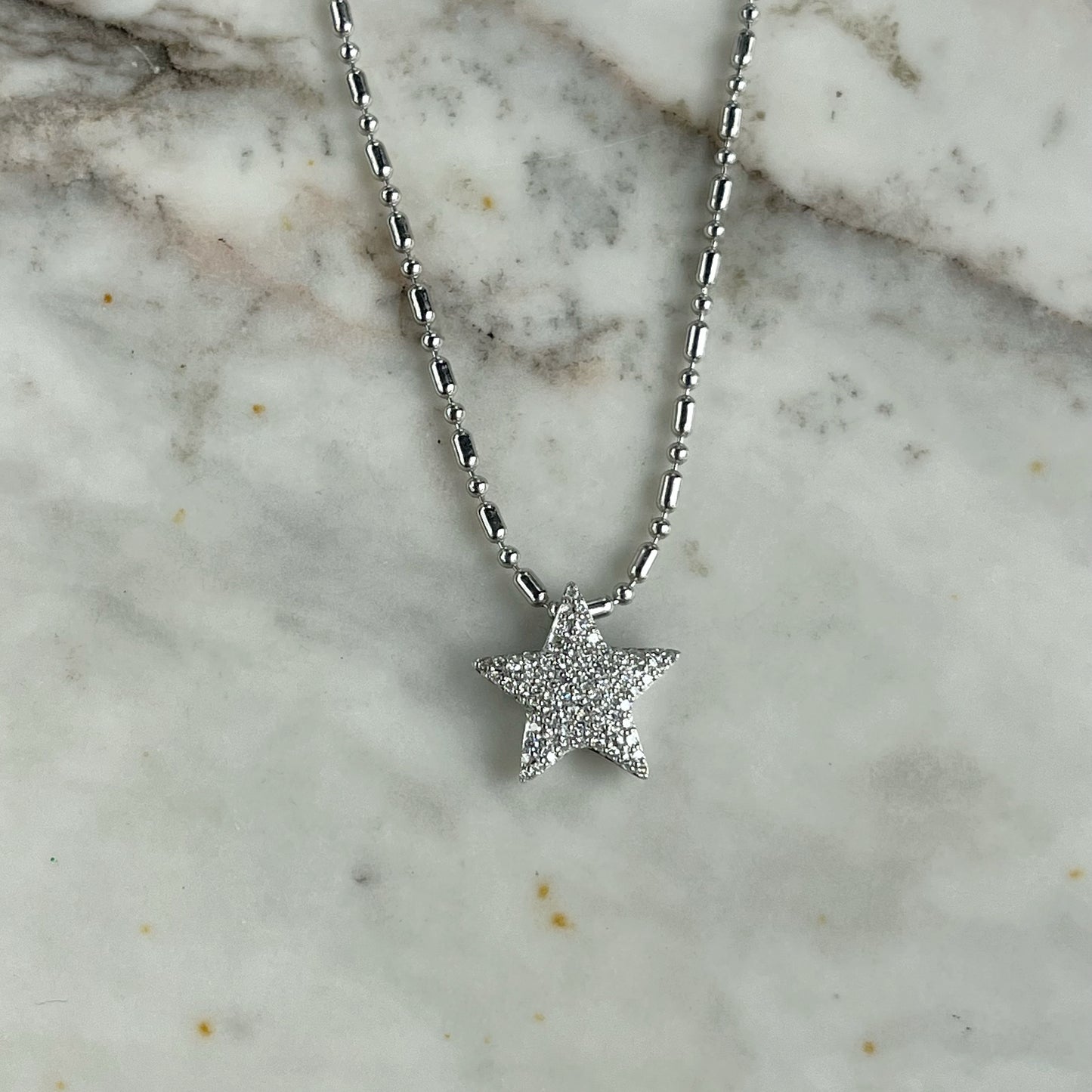 Collar en plata con dije de estrella con diamantes 0.25ctw