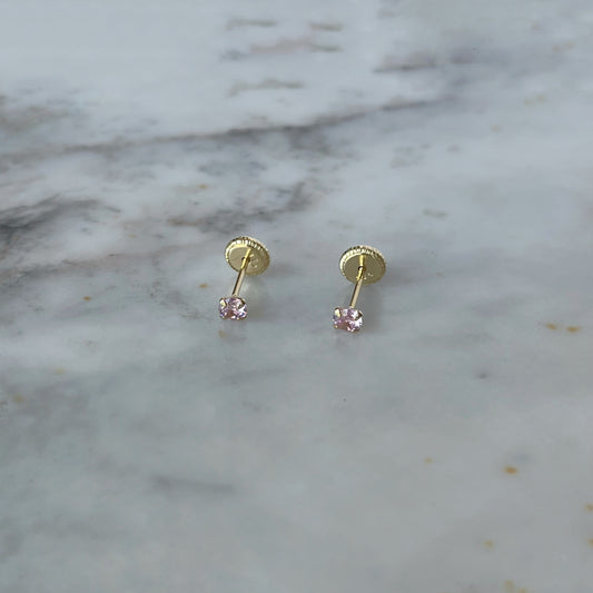 Aretes en oro amarillo de 18K con circonita rosada de 3mm con topa rosca