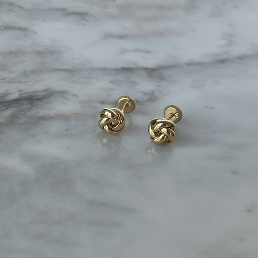 Aretes en oro amarillo de 18K nudo con tope rosca