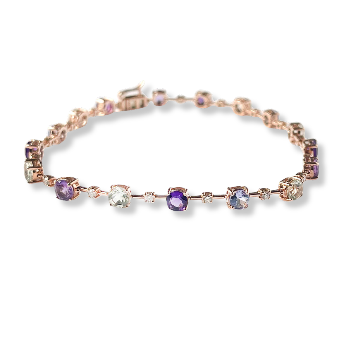 Pulsera en oro rosa 14k con amatistas, tanzanitas, aquamarinas, y diamantes 0.40ctw