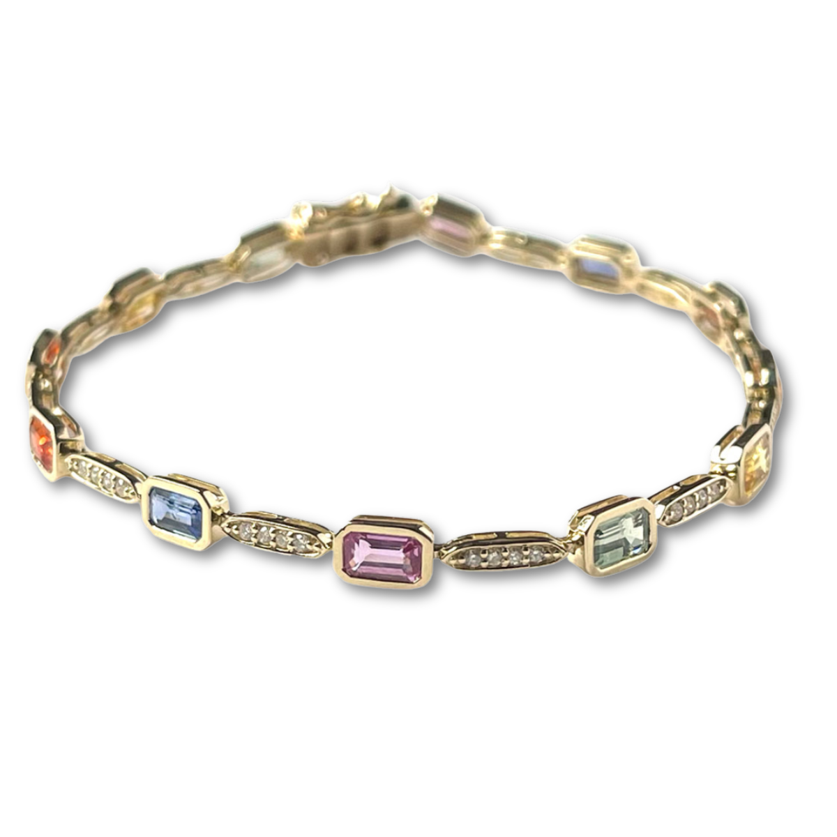 Pulsera en oro amarillo 14k con zafiros multicolor 8ctw y diamantes 0.65ctw