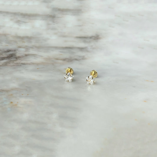 Aretes en oro amarillo 14k estrellas de circonitas blancas con broche rosca