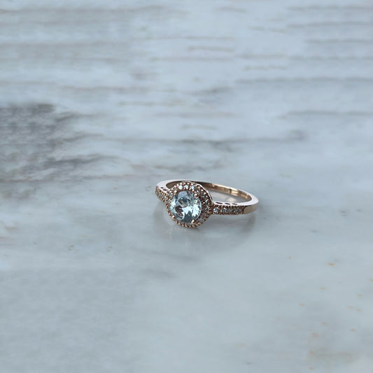 Anillo en oro rosa 14k con aquamarina y diamantes 0.15ctw