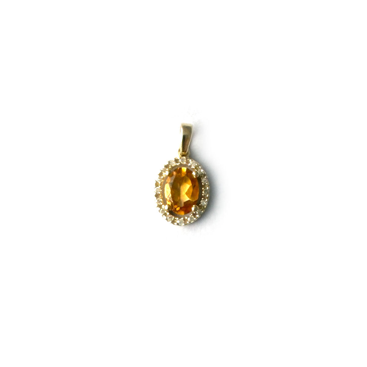 Dije de oro amarillo 10k con citrino ovalado y halo de diamantes 0.10ctw