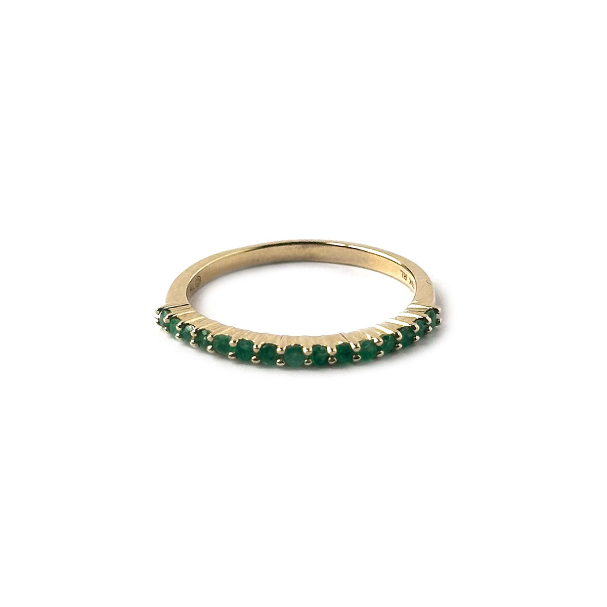 Anillo medio cintillo de esmeraldas en oro amarillo 10k