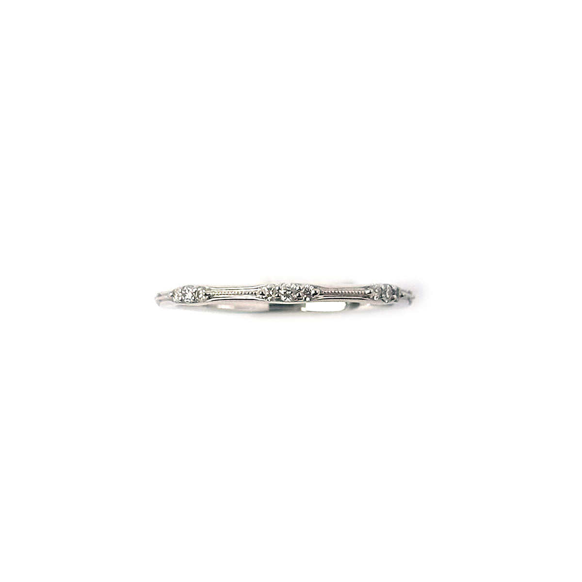 Anillo en oro blanco 14k con grupitos de diamantes 0.15ctw