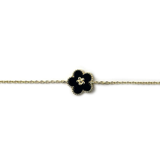 Pulsera de plata con baño de oro con flor de esmalte negro